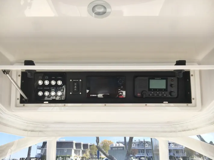  Yacht Photos Pics 2018 Jupiter 29 HFS boat console with controls and navigation equipment.