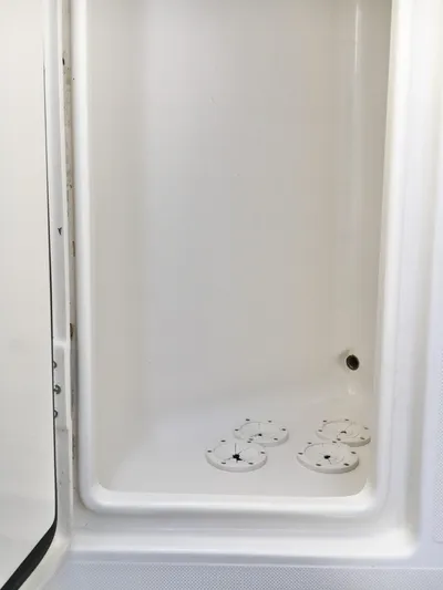  Yacht Photos Pics 2018 Jupiter 29 HFS boat storage compartment with drain and non-slip pads.