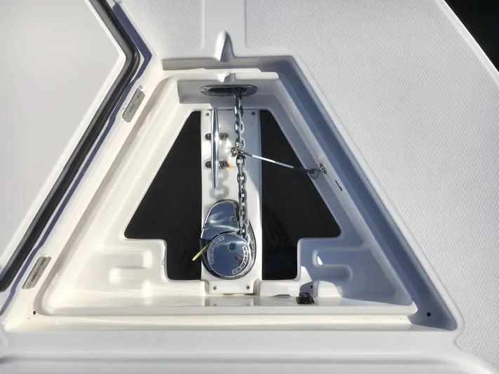  Yacht Photos Pics Anchor compartment of 2018 Jupiter 29 HFS boat with chain and winch.