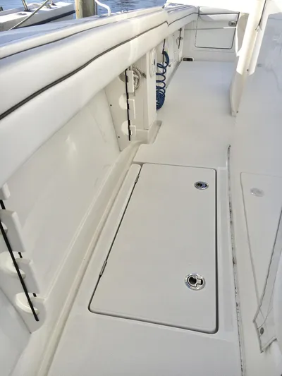  Yacht Photos Pics 2018 Jupiter 29 HFS boat deck with storage compartments and clean white finish.