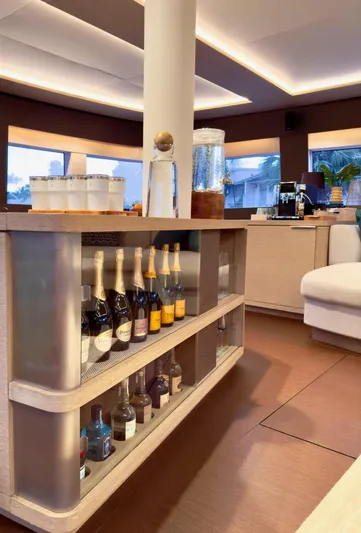 Twin Flame Yacht Photos Pics Luxurious interior of 2020 Lagoon Seventy 7 yacht with a well-stocked bar.