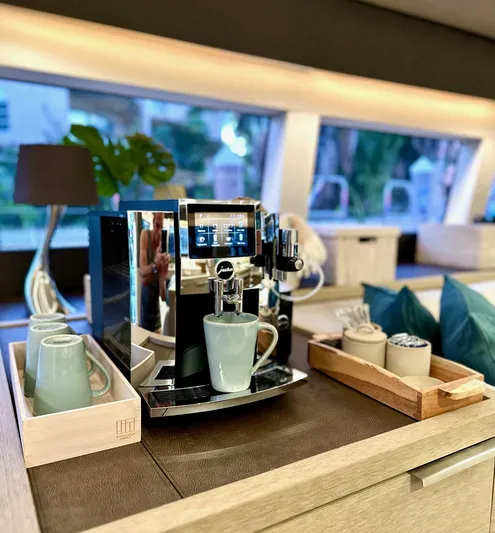 Twin Flame Yacht Photos Pics Luxury yacht interior with modern coffee machine on Lagoon Seventy 7, 2020 model.