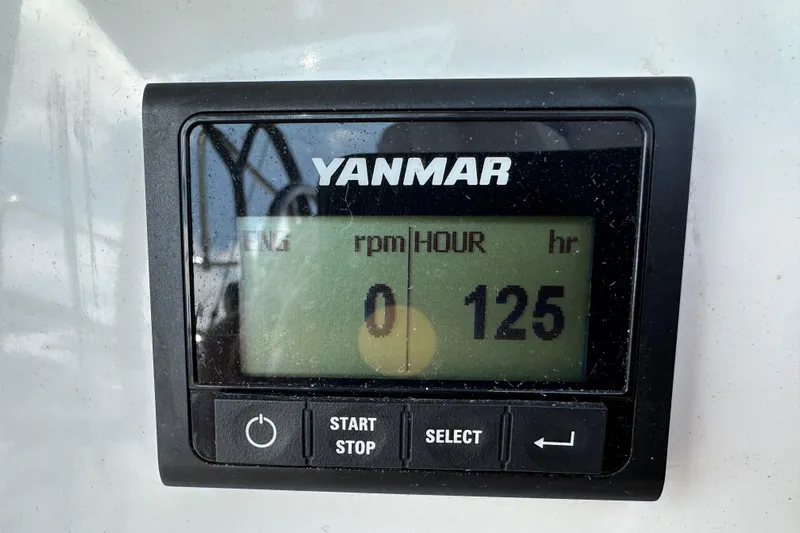 Endless Summer Yacht Photos Pics Yanmar engine hour meter displaying 125 hours on Jeanneau Sun Odyssey 410, 2024 model.