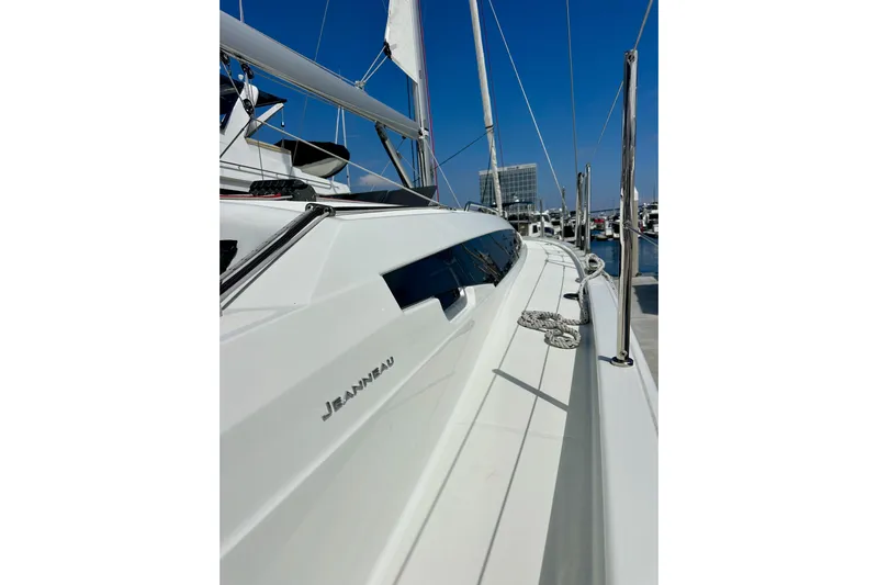 Endless Summer Yacht Photos Pics 2024 Jeanneau Sun Odyssey 410 sailboat docked, showcasing sleek design and modern features.