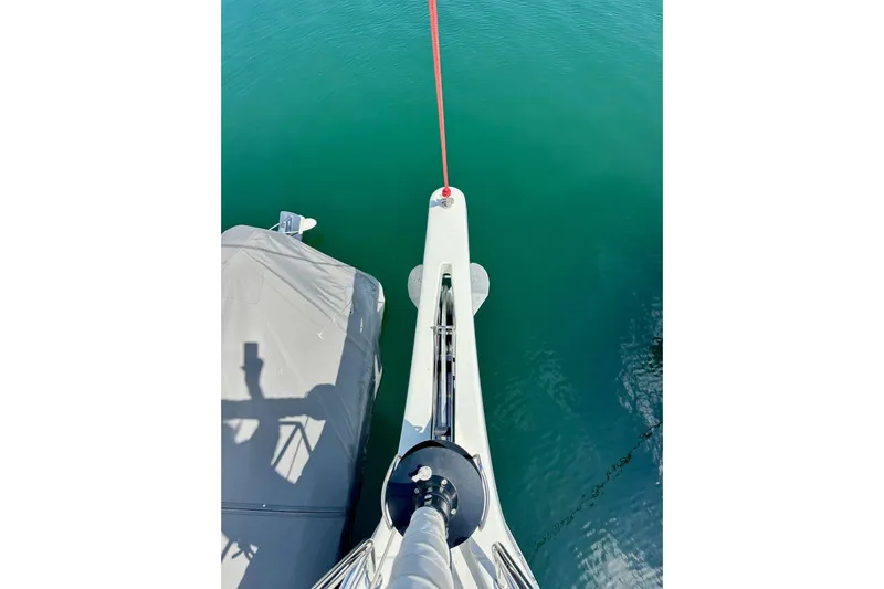 Endless Summer Yacht Photos Pics Overhead view of Jeanneau Sun Odyssey 410 yacht bow, 2024 model, on calm water.