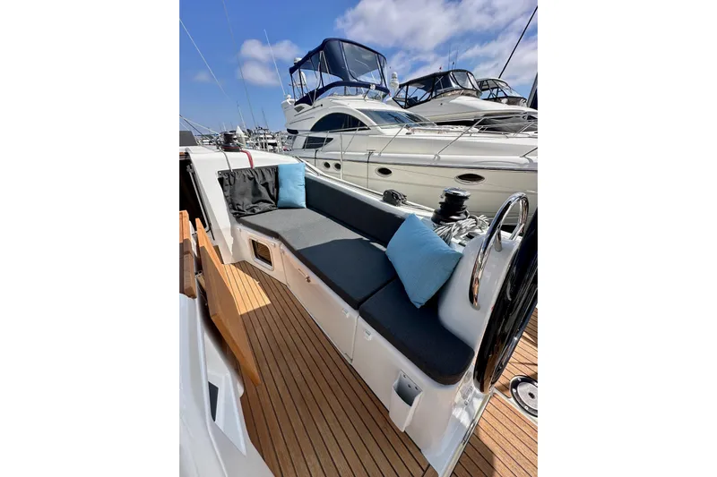 Endless Summer Yacht Photos Pics 2024 Jeanneau Sun Odyssey 410 sailboat with sleek deck and comfortable seating.