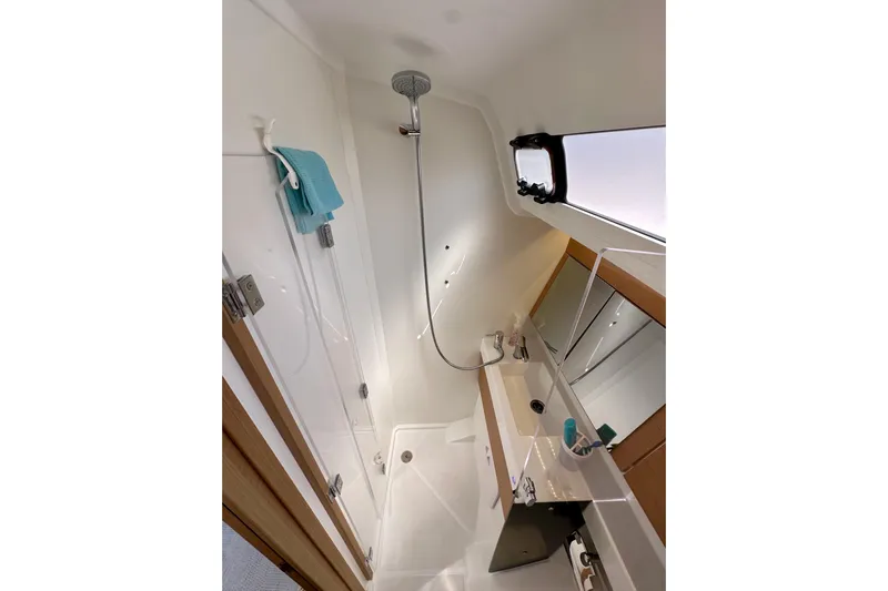 Endless Summer Yacht Photos Pics 2024 Jeanneau Sun Odyssey 410 bathroom with modern shower and sink.
