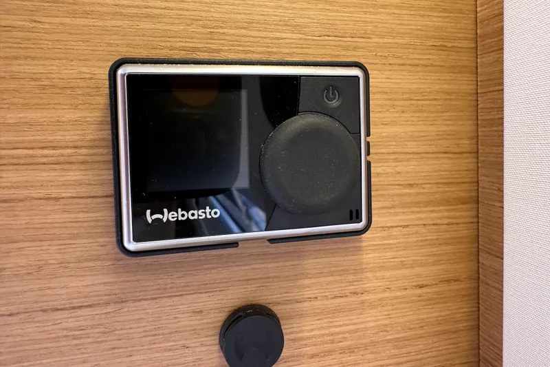 Endless Summer Yacht Photos Pics Webasto control panel on 2024 Jeanneau Sun Odyssey 410 yacht interior.