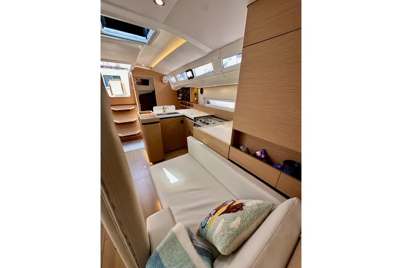 Endless Summer Yacht Photos Pics Interior of 2024 Jeanneau Sun Odyssey 410 yacht, featuring modern design and cozy seating.