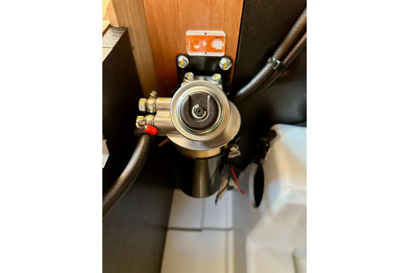 Endless Summer Yacht Photos Pics Engine component of 2024 Jeanneau Sun Odyssey 410 sailboat, showcasing intricate mechanical details.