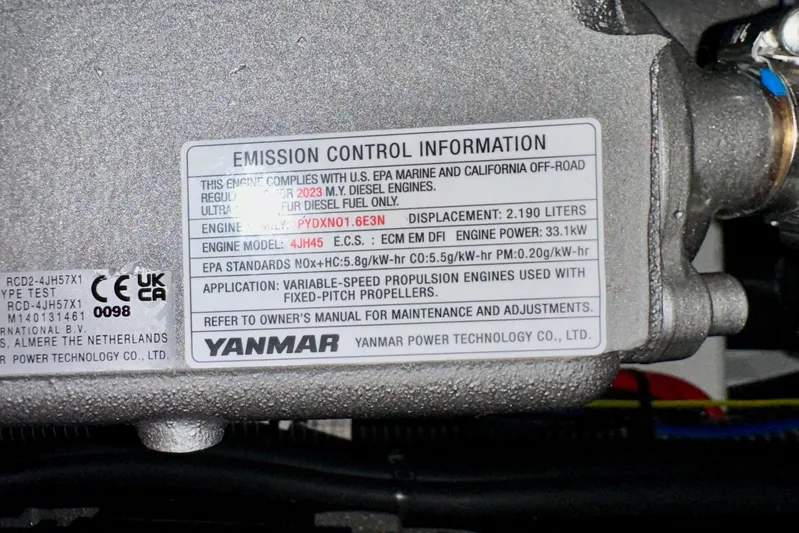 Endless Summer Yacht Photos Pics Emission control label on Yanmar engine for Jeanneau Sun Odyssey 410, 2024 model.