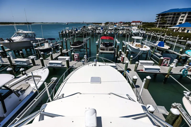 Patriot Yacht Photos Pics Marina view with docked boats, featuring a 2005 Carolina Classic 32.