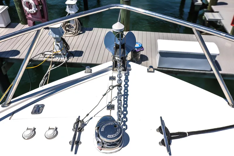 Patriot Yacht Photos Pics Bow of 2005 Carolina Classic 32 boat with anchor and chain at dock.
