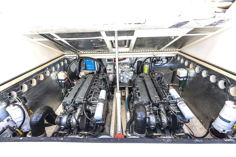 Patriot Yacht Photos Pics 2005 Carolina Classic 32 engine compartment with dual engines and mechanical components.