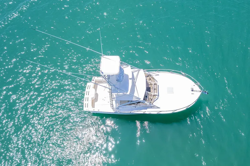 Patriot Yacht Photos Pics Aerial view of 2005 Carolina Classic 32 boat on turquoise water.