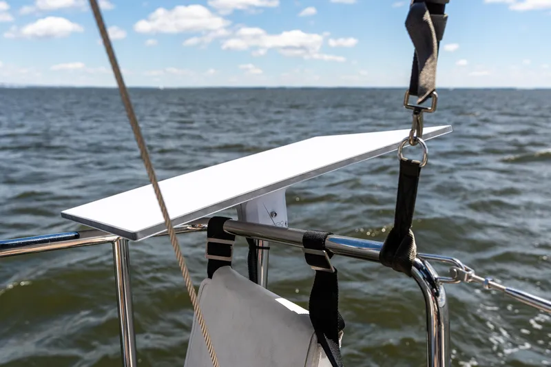 The Siren's Song Yacht Photos Pics Sailing on a 2023 Hanse 348 yacht with clear skies and calm waters.