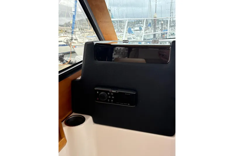 Andiamo Yacht Photos Pics Interior view of 2020 Cutwater C-28 boat with control panel and window.