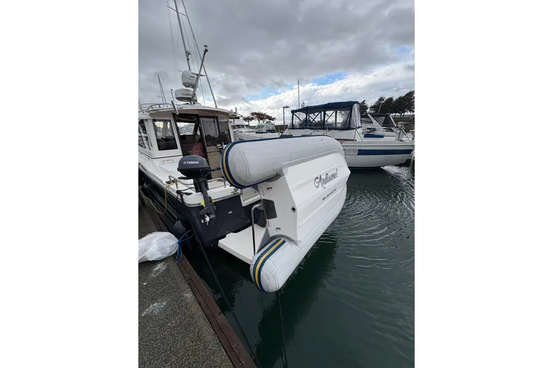 Andiamo Yacht Photos Pics 2020 Cutwater C-28 boat docked with Yamaha motor and inflatable fenders.