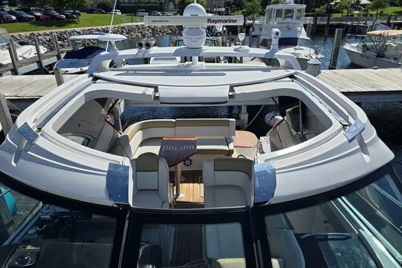  Yacht Photos Pics 2009 Four Winns V435 yacht with open deck, docked at marina.