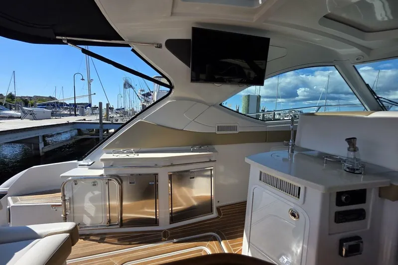  Yacht Photos Pics Luxurious 2009 Four Winns V435 yacht interior with modern amenities and marina view.