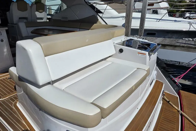  Yacht Photos Pics Luxury seating on 2009 Four Winns V435 yacht, docked with elegant interior design.