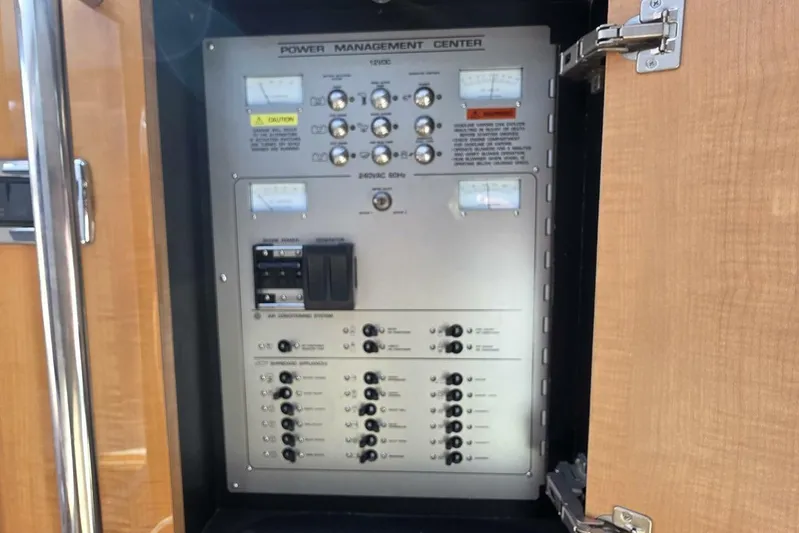  Yacht Photos Pics Power management center on 2009 Four Winns V435 boat, featuring control switches and gauges.