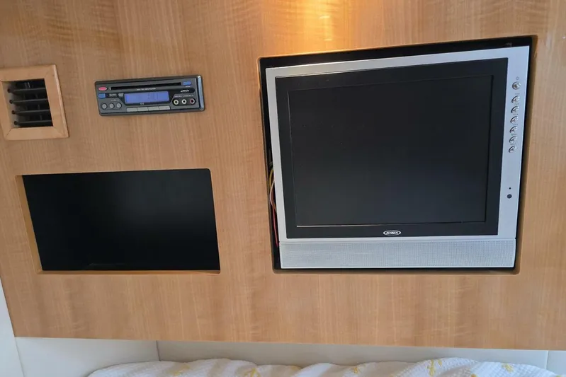 Yacht Photos Pics 2009 Four Winns V435 interior with built-in TV and audio system.