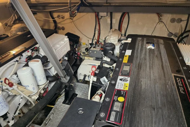  Yacht Photos Pics Engine room of a 2009 Four Winns V435 boat, showcasing detailed mechanical components.