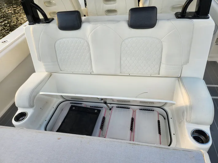  Yacht Photos Pics 2019 HCB 39 Speciale boat seat with storage compartment open.