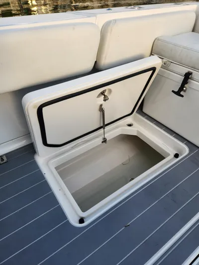  Yacht Photos Pics Open storage compartment on 2019 HCB 39 Speciale boat with cushioned seating.