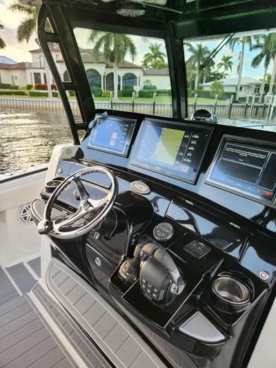  Yacht Photos Pics 2019 HCB 39 Speciale boat dashboard with advanced navigation screens and controls.