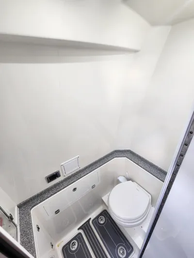  Yacht Photos Pics 2019 HCB 39 Speciale boat bathroom with modern fixtures and compact design.