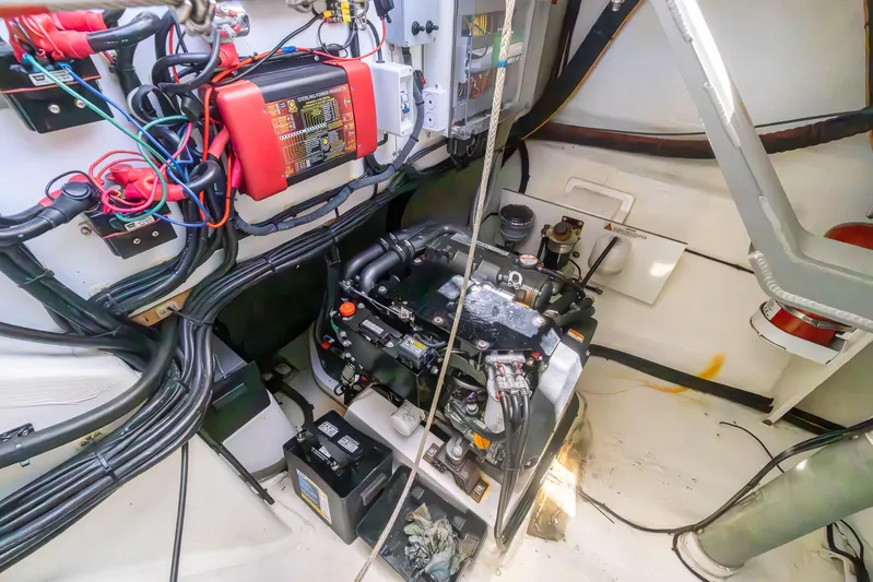 One Love Yacht Photos Pics Engine room of a 2019 Leopard 50 yacht with wiring and battery systems.