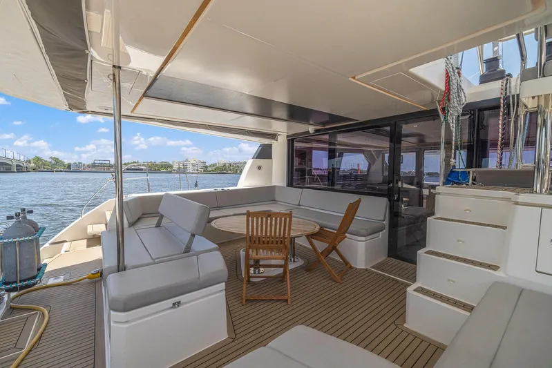 One Love Yacht Photos Pics Leopard 50 2019 yacht with spacious outdoor seating and scenic water view.