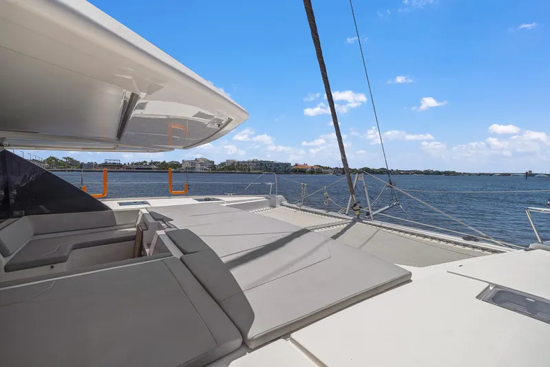 One Love Yacht Photos Pics Leopard 50 yacht 2019 model, spacious deck with sun loungers, scenic water view.