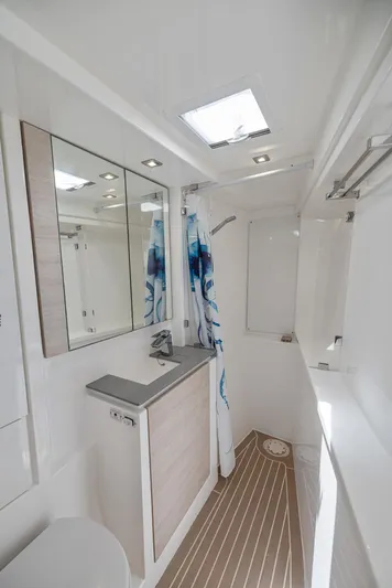 One Love Yacht Photos Pics Modern bathroom in 2019 Leopard 50 yacht with skylight and shower.