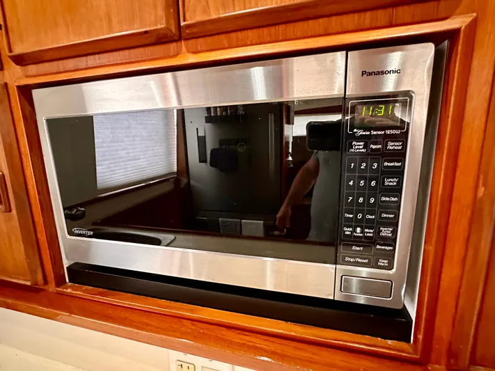 Farbrengen Yacht Photos Pics Built-in Panasonic microwave in a Bertram 54 Convertible yacht kitchen, 1982 model.