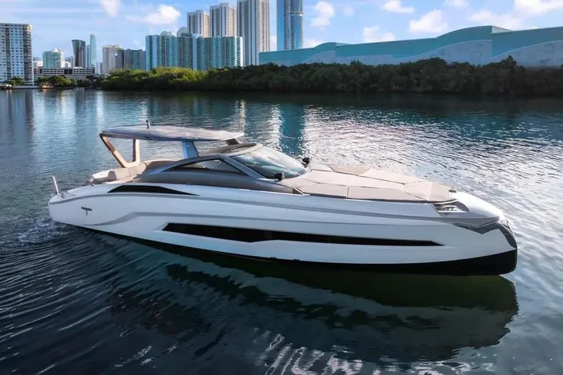  Yacht Photos Pics Luxury Tecnomar Evo 55 yacht cruising near city skyline, 2017 model.