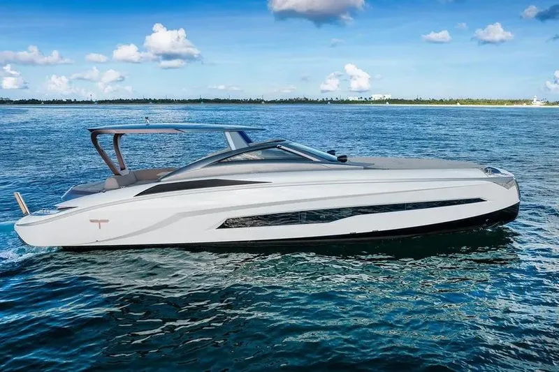  Yacht Photos Pics Tecnomar Evo 55 yacht cruising on open water, 2017 model, sleek design.