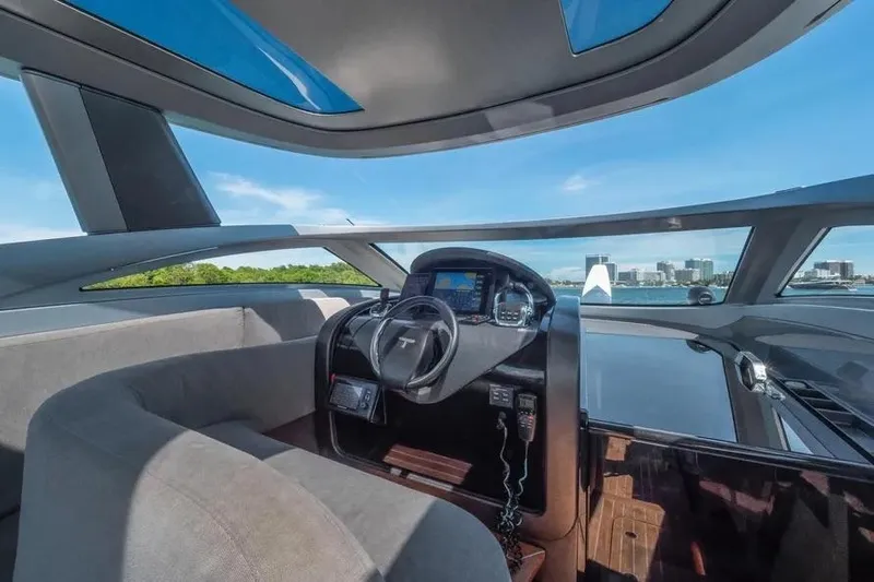  Yacht Photos Pics Interior view of 2017 Tecnomar Evo 55 yacht cockpit with modern design and panoramic windows.
