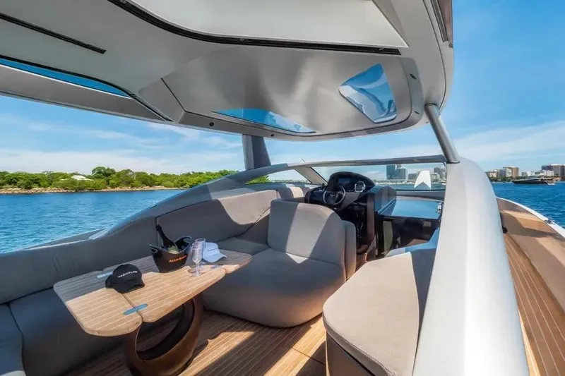  Yacht Photos Pics Luxurious Tecnomar Evo 55 yacht interior, 2017 model, featuring sleek design and comfortable seating.