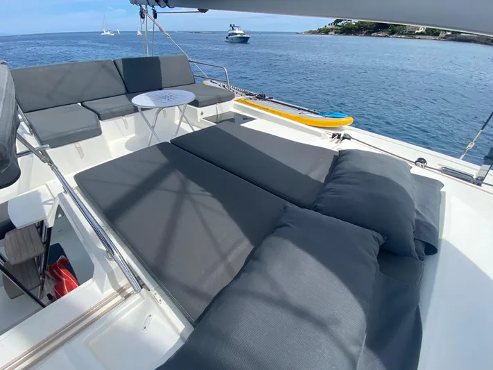 Enotan Yacht Photos Pics Luxurious 2020 Fountaine Pajot Saona 47 catamaran deck with comfortable seating and ocean view.