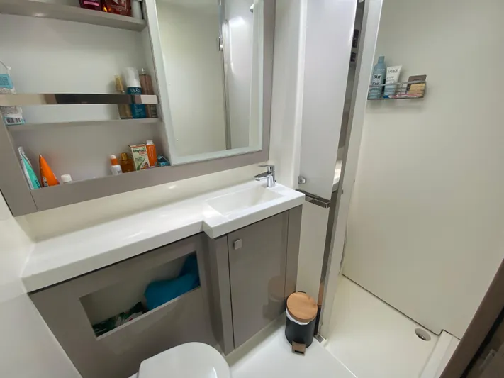 Enotan Yacht Photos Pics Modern bathroom in 2020 Fountaine Pajot Saona 47 yacht with sleek fixtures and storage.