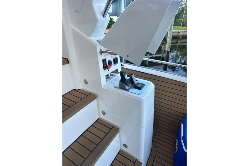 American Dream Yacht Photos Pics Control panel on Schaefer 660 yacht, 2023 model, with wooden deck steps.