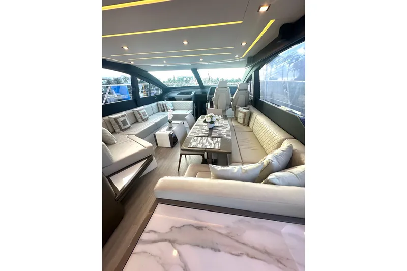 American Dream Yacht Photos Pics Luxurious interior of 2023 Schaefer 660 yacht with elegant seating and modern design.