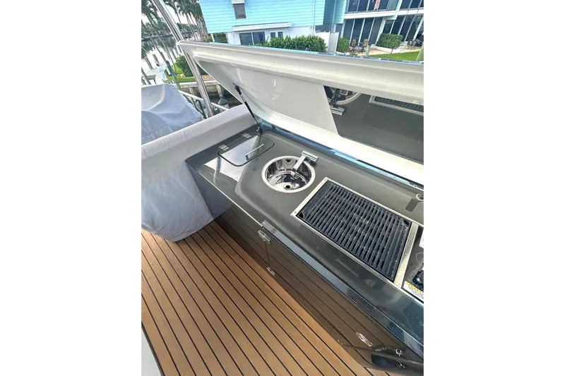 American Dream Yacht Photos Pics Outdoor kitchen on 2023 Schaefer 660 yacht with grill and sink.