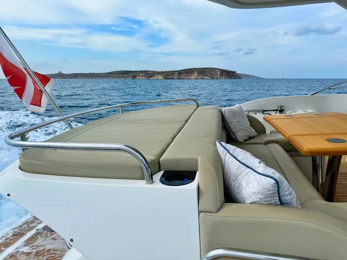 The Office Yacht Photos Pics Luxurious Sunseeker Manhattan 55 yacht, 2015 model, with elegant seating and ocean view.