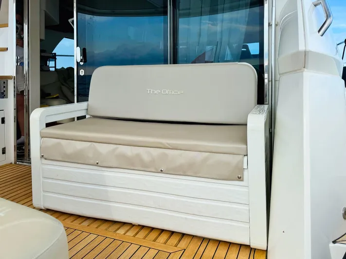 The Office Yacht Photos Pics Sunseeker Manhattan 55 yacht seating area with beige cushions, 2015 model.