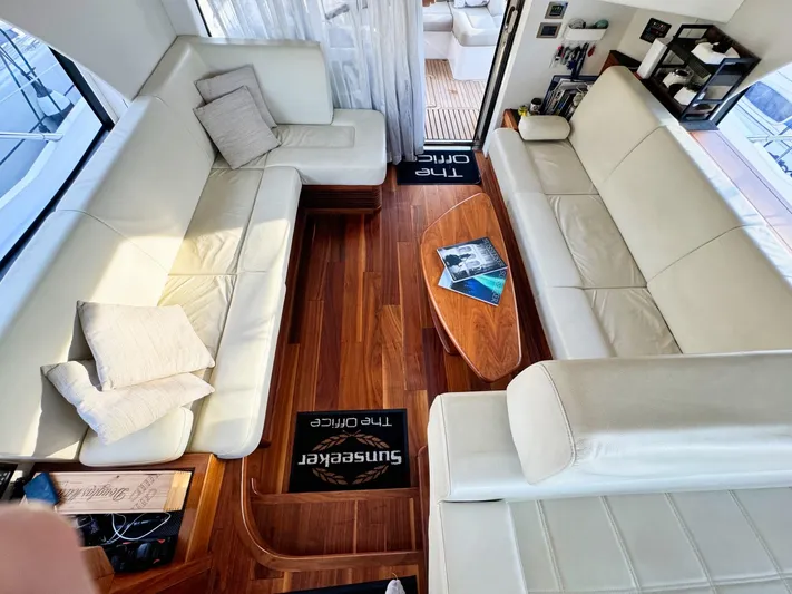 The Office Yacht Photos Pics Luxurious interior of 2015 Sunseeker Manhattan 55 yacht with white leather seating.