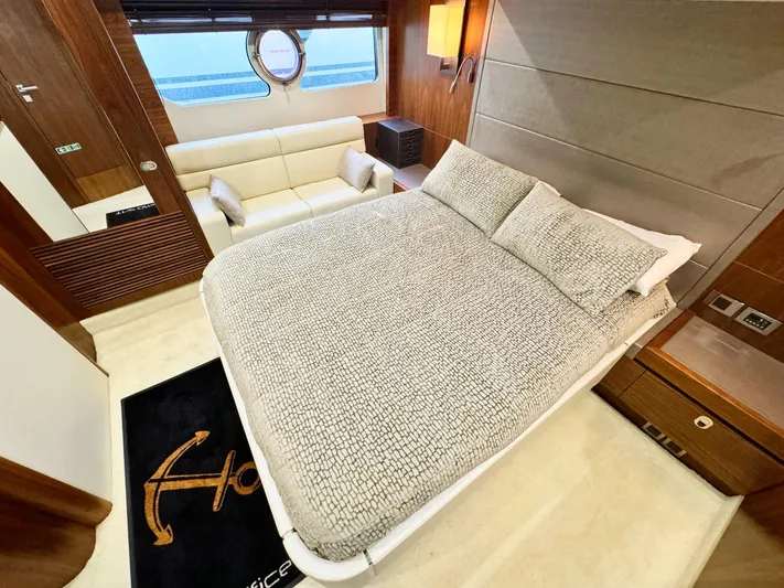 The Office Yacht Photos Pics Luxurious bedroom interior of 2015 Sunseeker Manhattan 55 yacht with modern furnishings.